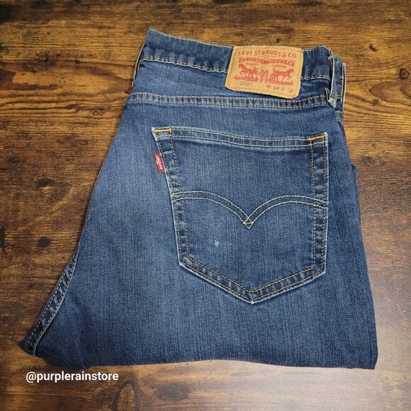 Levi's Jeans 34x32 measures 34x30 Taper Fit Medium Dark Wash Stretch Denim - Picture 3 of 12